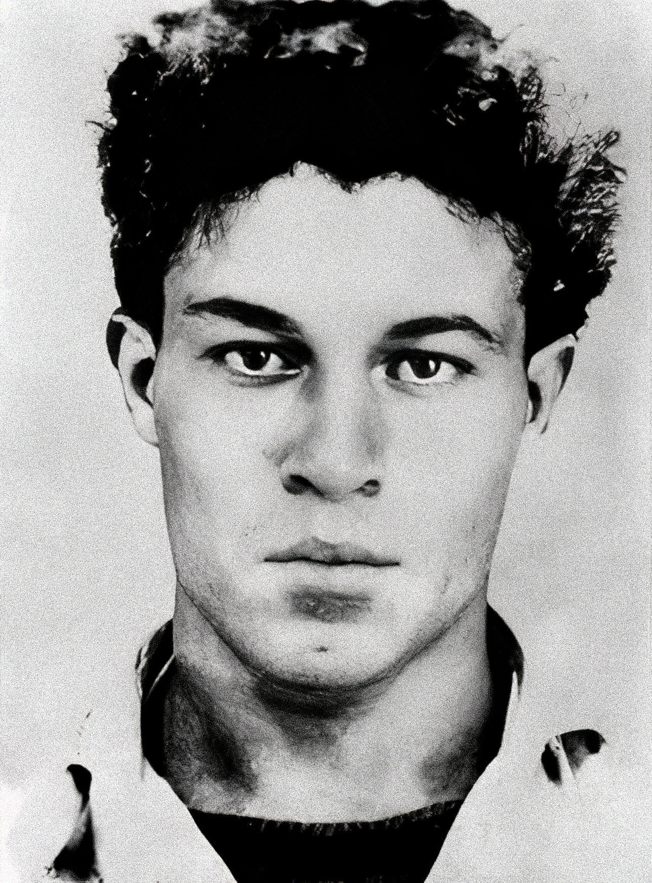 Ali La Pointe, FLN urban guerrilla fighter in the Battle of Algiers, photographed before his death in October 1957. Ali La Pointe was transformed from a petty criminal into one of the FLN's most effective fighters by Yacef Saadi, and died refusing to surrender when French paratroopers demolished the hidden room where he was sheltering in the Casbah.