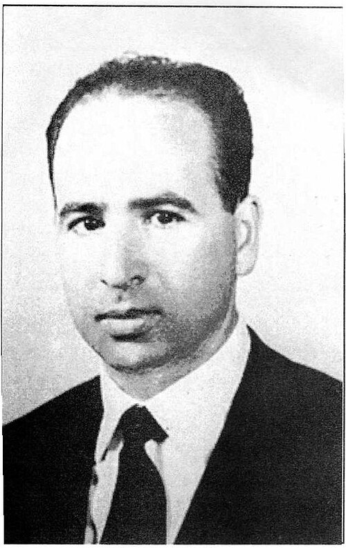 Belkacem Krim, one of the nine historic founders of the FLN, commander of the Kabylie maquis, and chief Algerian negotiator of the Evian Accords of 1962. Krim was strangled in a Frankfurt hotel room in 1970 by agents of the Algerian government he had helped create.