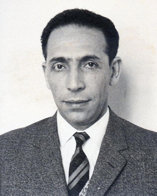 Mohamed Boudiaf, FLN co-founder and one of the nine historic chiefs who launched the Algerian War of Independence on 1 November 1954, photographed during his political career. Boudiaf spent nearly three decades in exile after opposing Houari Boumédiène's seizure of power, returned to Algeria in January 1992 to lead the country through its worst political crisis, and was assassinated on 29 June 1992 — his murder one of the defining unsolved crimes of modern Algerian history.
